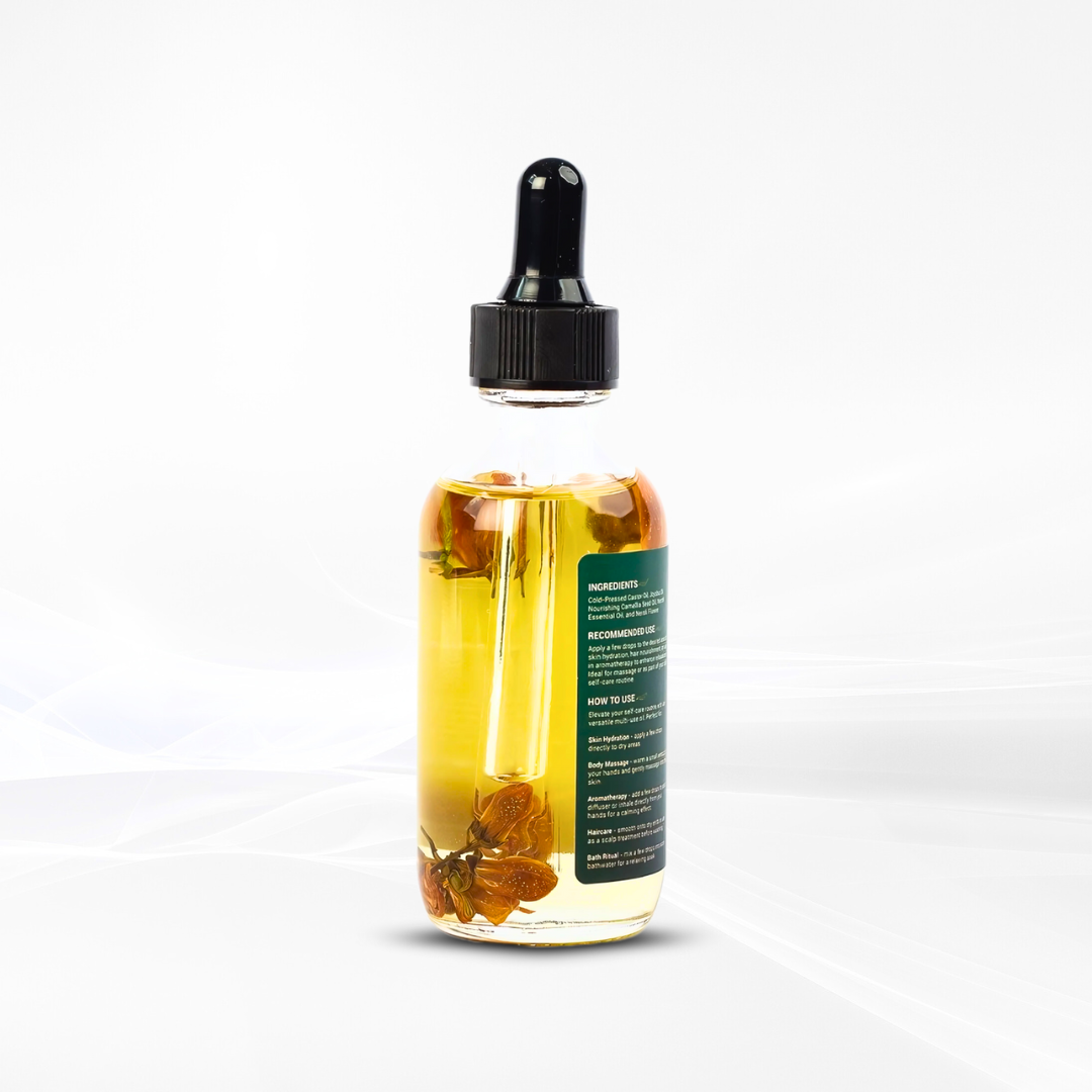 TrustBotics Neroli Essential Oil bottle rear view showcasing rich orange neroli petals inside the oil, emphasizing premium natural ingredients and detailed label.