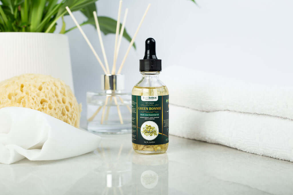 TrustBotics Green Bonnie Flower Essential Oil bottle – spa-inspired flat lay with natural elderflower oil for skin care and aromatherapy.