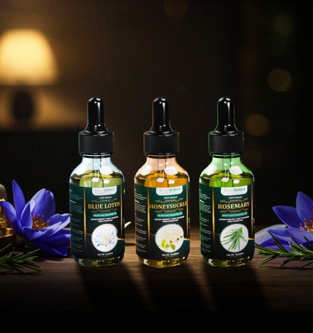 TrustBotics Blue Lotus, Honeysuckle and Rosemary multi-use essential oils displayed together for natural aromatherapy, daily wellness rituals, skin care and mindful evening self-care routine