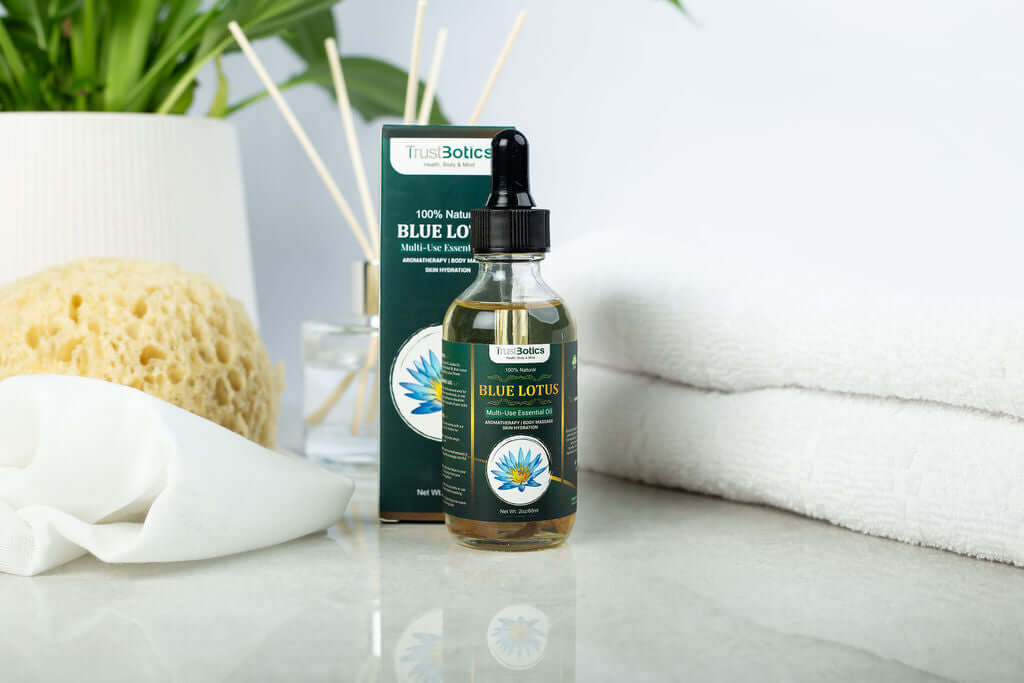 Blue Lotus Multi-Use Essential Oil bottle with packaging, showcasing TrustBotics brand and its natural beauty.