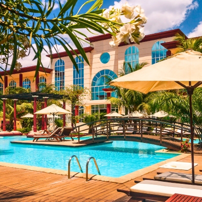 Luxury hotel spa resort with pool and relaxation area representing TrustBotics hospitality and wellness partnership opportunities.